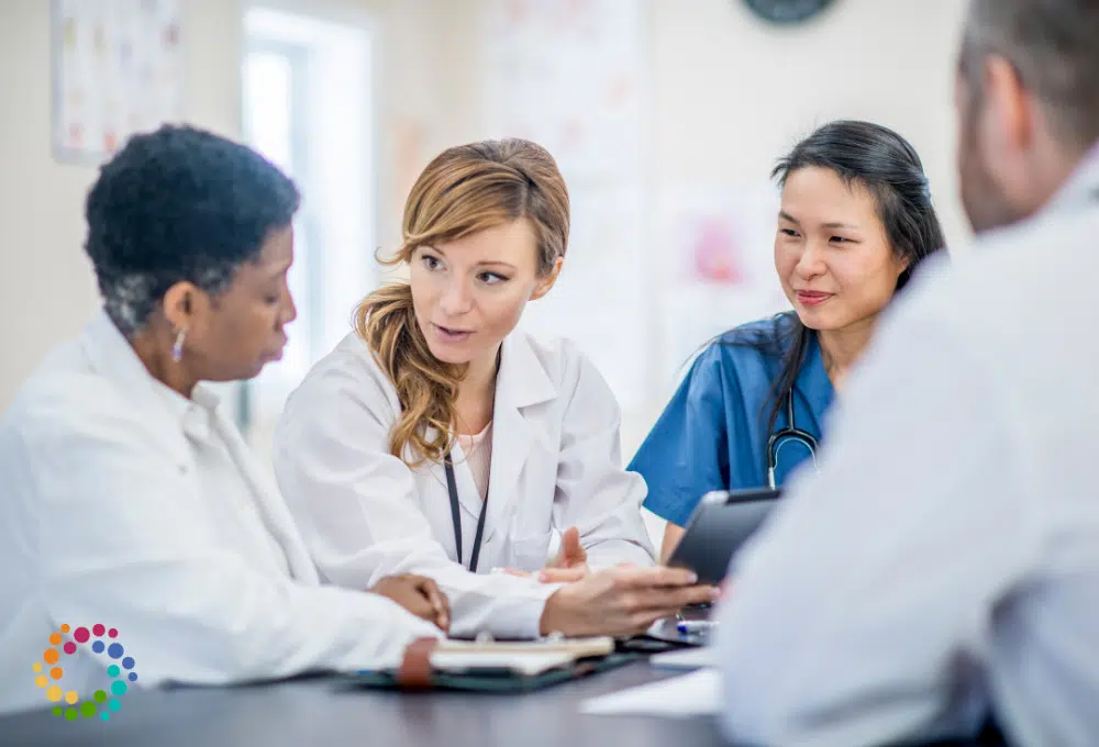 Group of doctors talking at a table